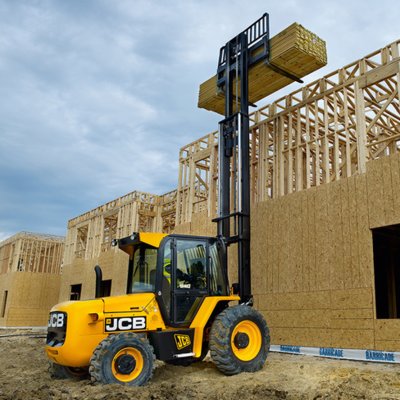 Forklift unloading machinery and industrial equipment in Hertford
